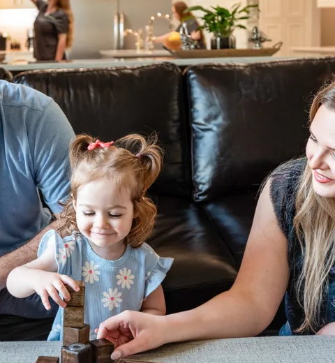 Family Playing Games in Living Room