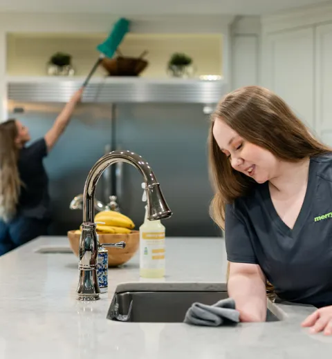 Team Member Cleaning Kitchen