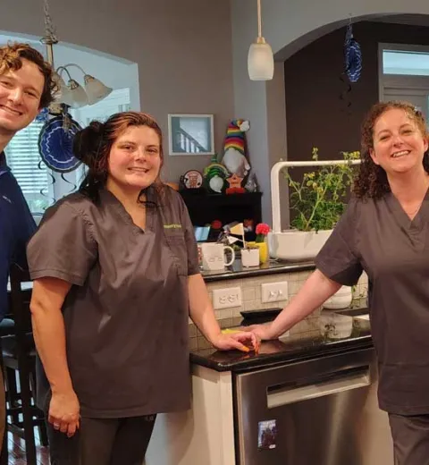 merry maids team in a kitchen