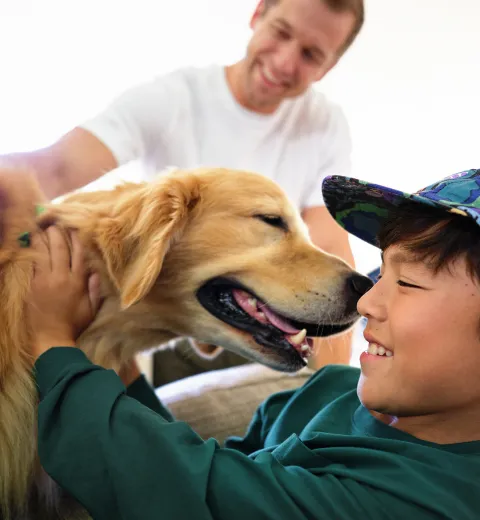 boy with dad and dog