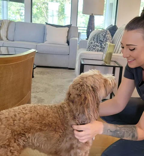 Tami with customer's dog