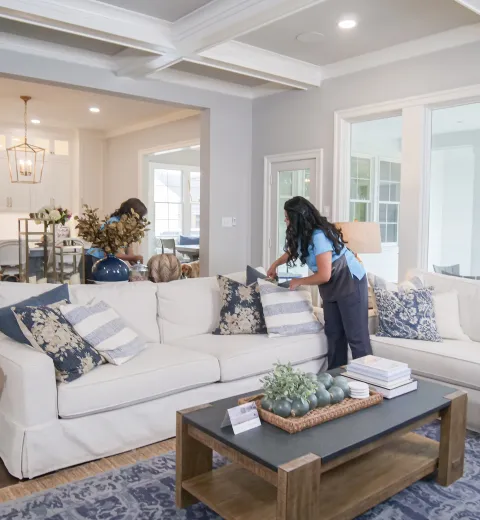 merry maids cleaning a living room