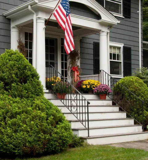 House with American Flag.