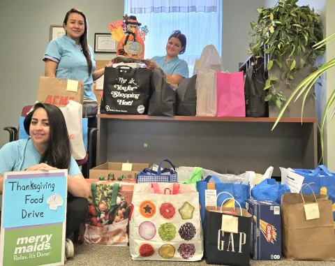 merry maids doing a food drive for thanksgiving