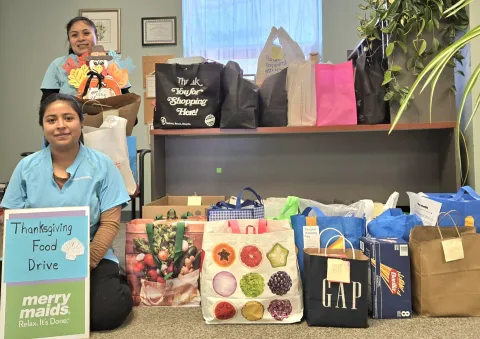 merry maids doing a food drive for thanksgiving