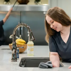 Team Members cleaning kitchen