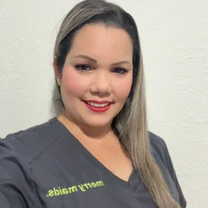 merry maid wearing a grey uniform