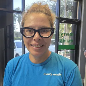 smiling merry maid with blue tshirt