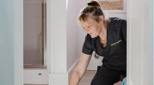 Team Member Cleaning Floor