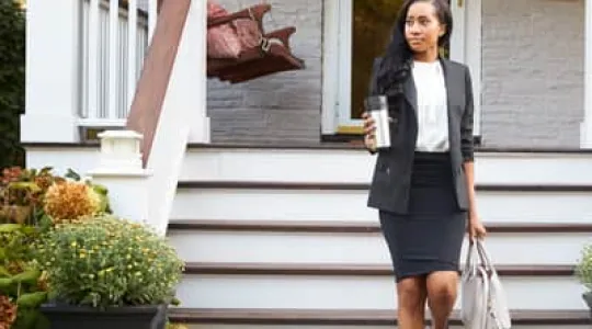 woman leaving her home in the morning ready for work