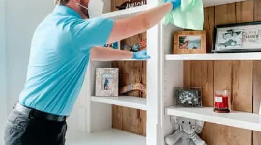 Merry Maid cleaning shelving