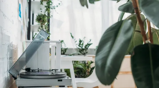 Records on a record player in a home.