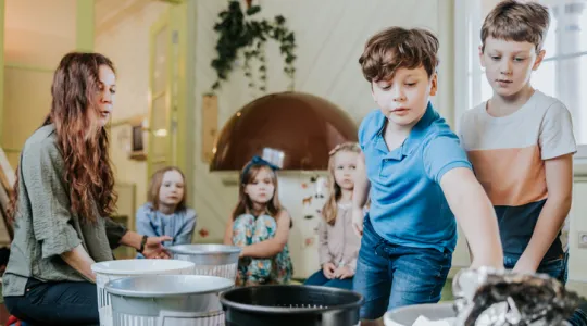 Children learning how to recycle garbage | Merry Maids