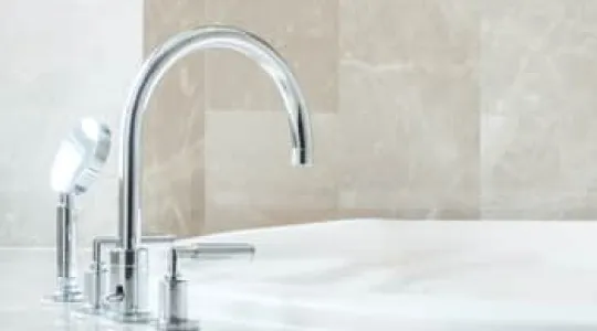 Clean rust stains from bathtub