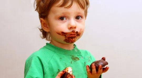 Messy Child Eating Chocolate