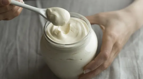 Woman uses Mayonnaise  as a cleaning product