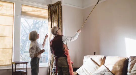 Senior man is helping his wife with the housework | Merry Maids