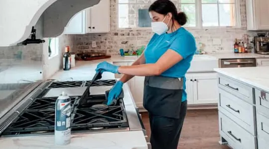 Merry Maids Cleaning a Stove