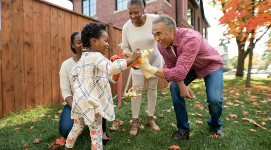 African American family enjoying fall weather
