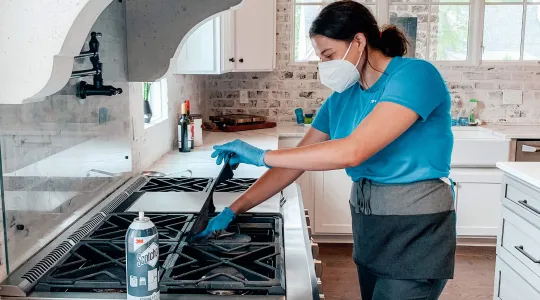 Merry Maid Cleaning Stove