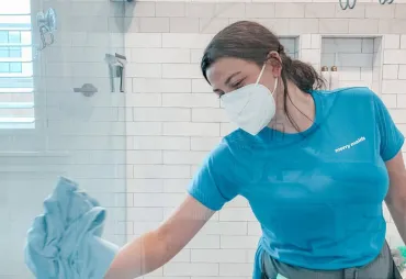 merry maid cleaning a shower