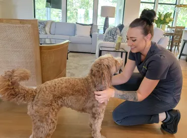 Tami with customer's dog