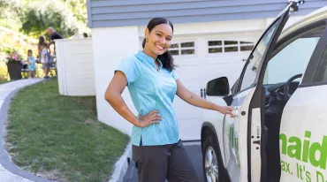 Team member next to vehicle