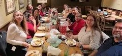 merry maids family eating christmas dinner