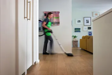 merry maid vacuuming