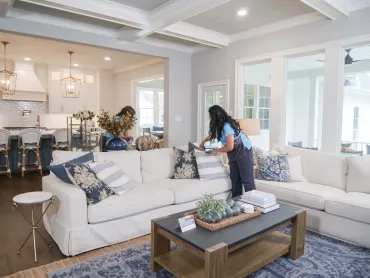 merry maids cleaning a living room