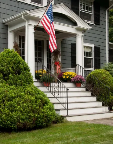 House with American Flag.
